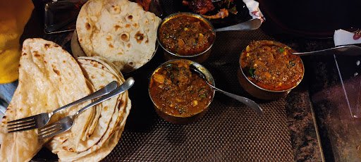 Di Table 9 Family Restaurant | KT Road, Tirupati