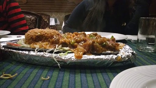 Temptation Family Restaurant In Amritsar- Amritsari sizzlers, Best food in Amritsar- fish meuniere