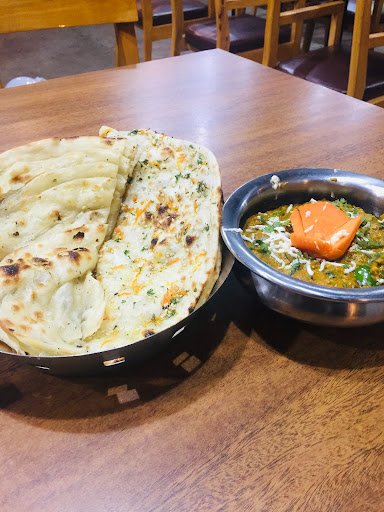 New Woody's Multicusine Restaurant